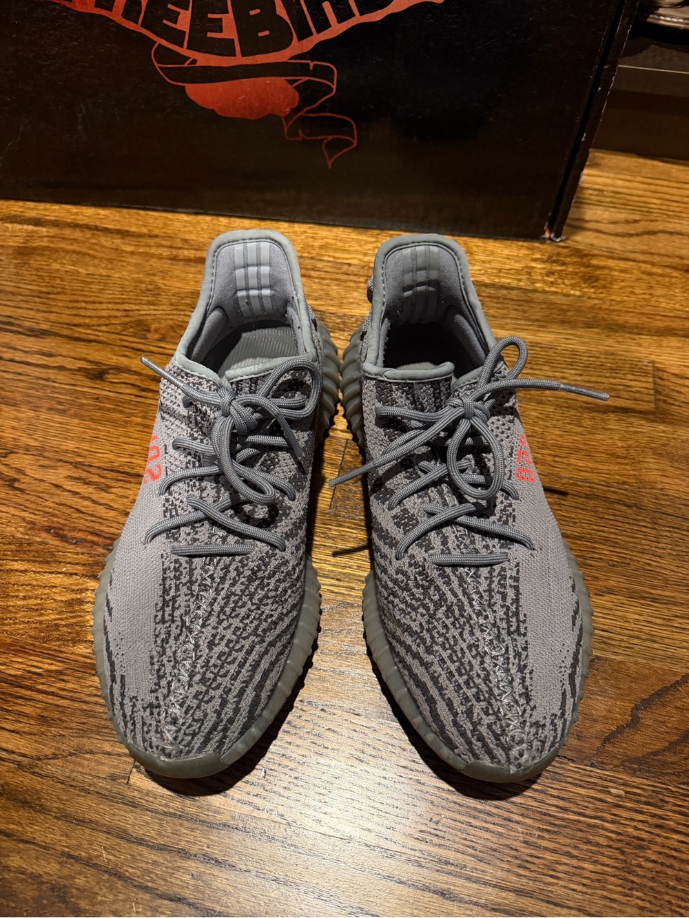 adidas Yeezy Grey Knit Low-Top Sneakers with Red Accent